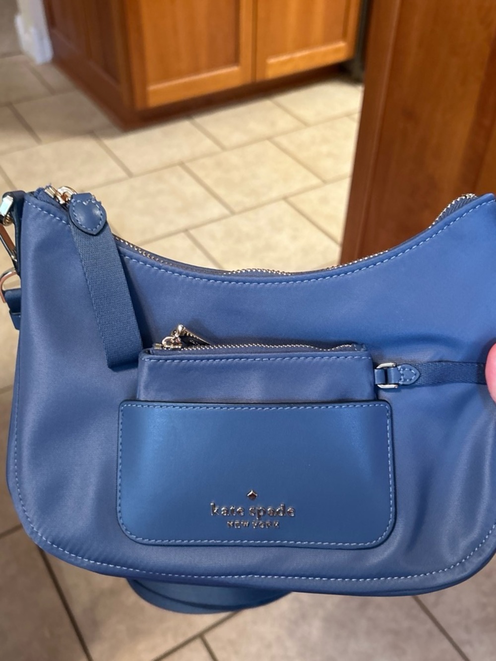 kate spade blue leather crescent crossbody with front pocket